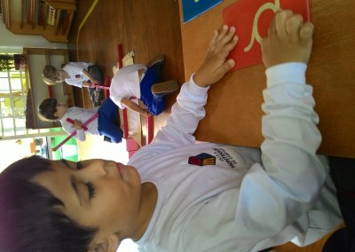 Lucas trabalhando com a letra 'o".