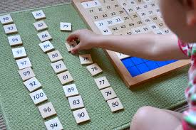 Child working on the 100 board